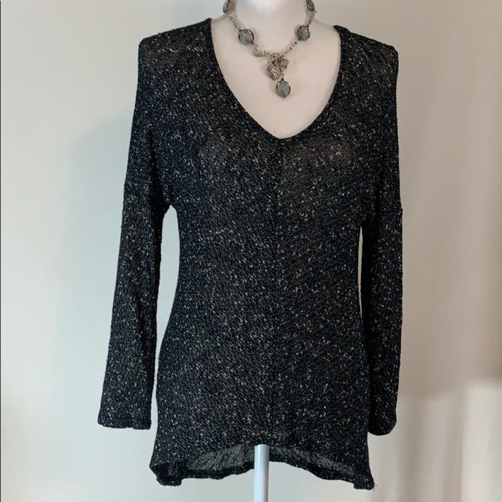 Flattering Black and White Top Size Medium.